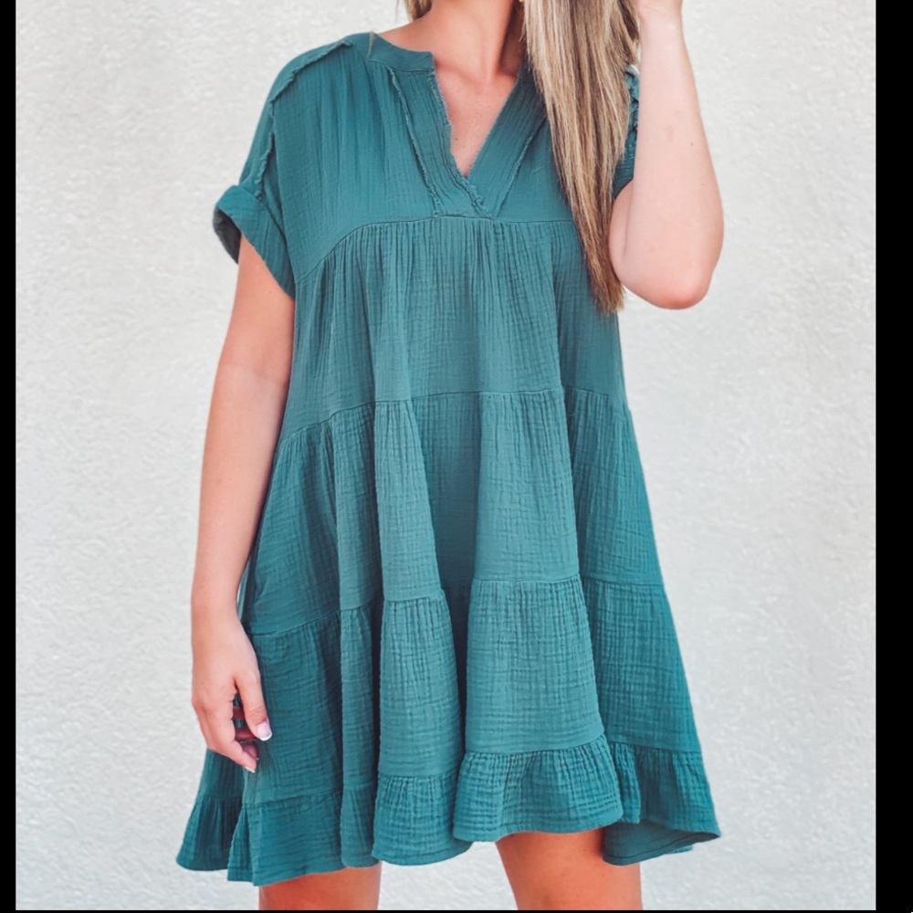 Teal dress. Never worn.